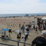 rows and rows of crosses and the Santa Monica beach in the distance - the Arlington West memorial to veteran and civilian deaths in war. Photo by Ruth Benn, May 6, 2018.