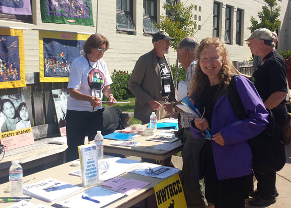 Anne Barron set up the NWTRCC/war tax resistance literature table at the 31st Annual Veterans for Peace Convention in Berkeley, California. “Peace at Home, Peace Abroad; A Just and Sustainable Future for the World’s Children” was the theme of the convention, which was held August 11–15.